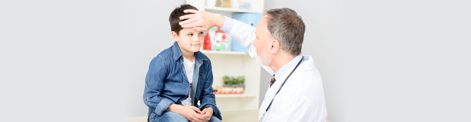 doctor checking a kid